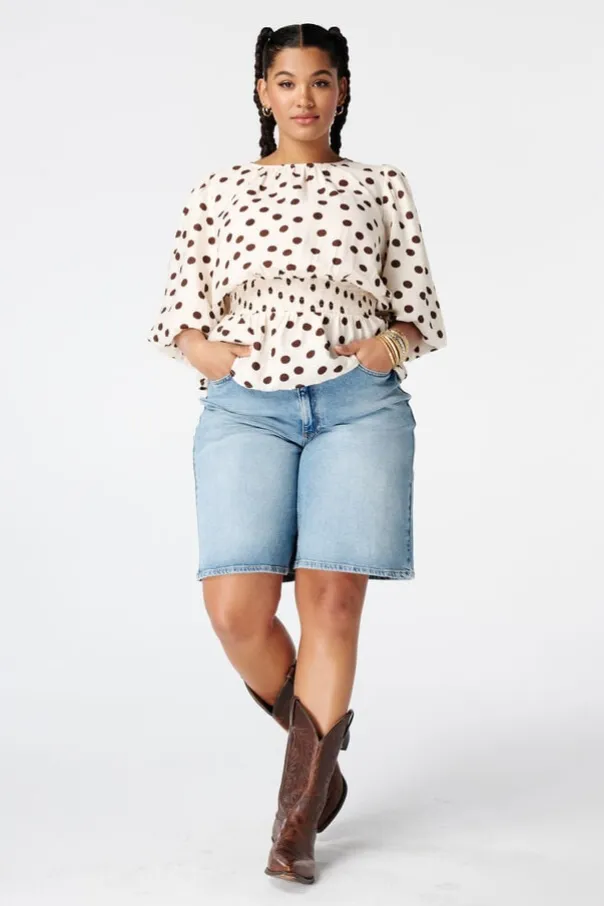 Blouse cintrée à pois