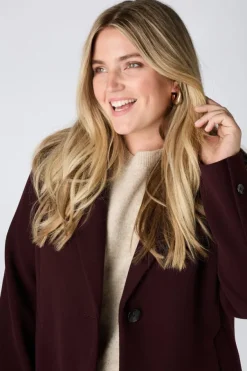 Manteau court à boutons
